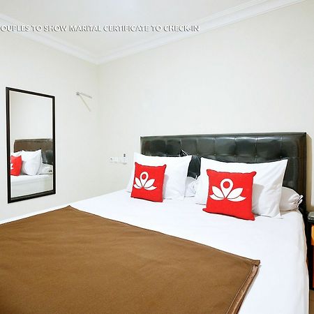 Zen Rooms Kuningan Syariah Джакарта Экстерьер фото