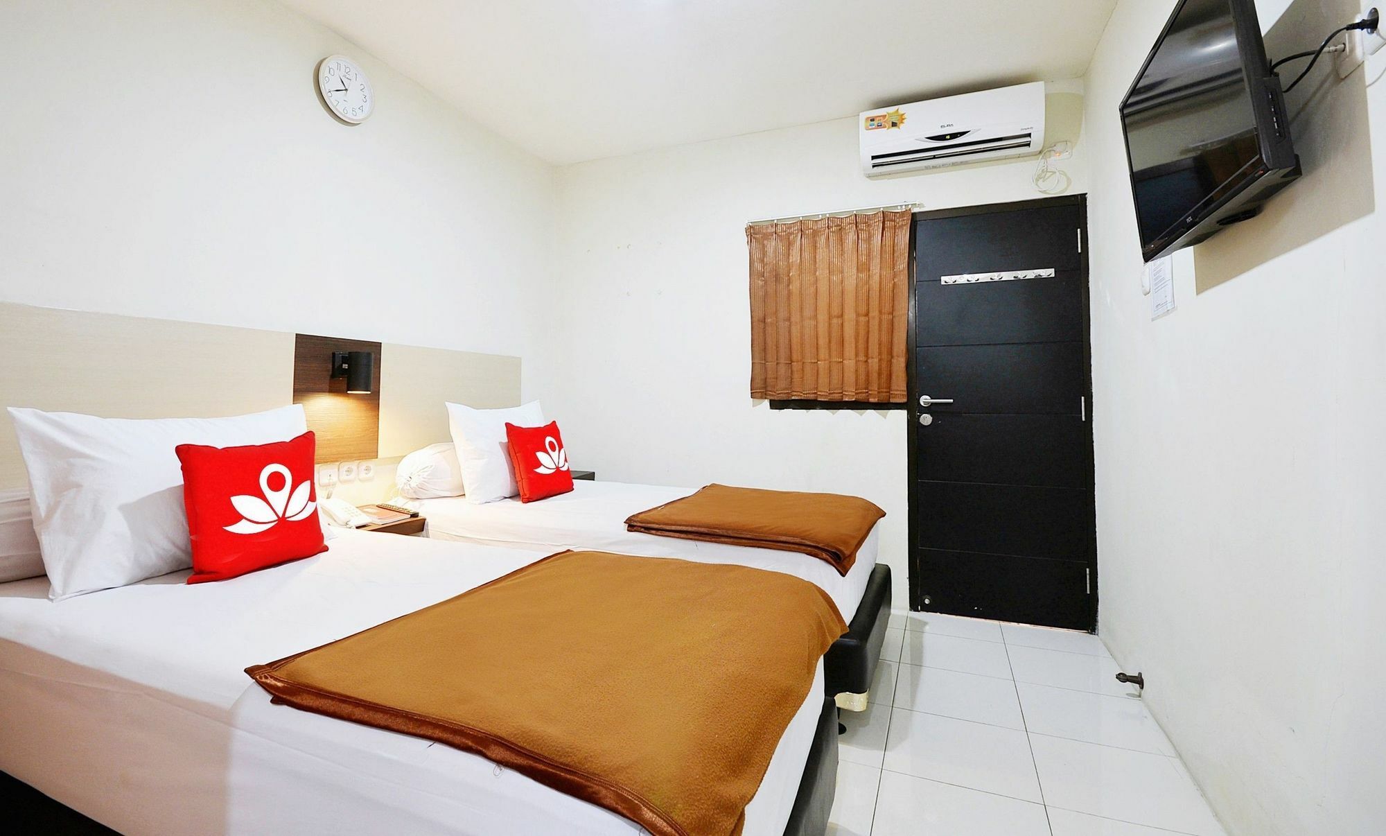Zen Rooms Kuningan Syariah Джакарта Экстерьер фото